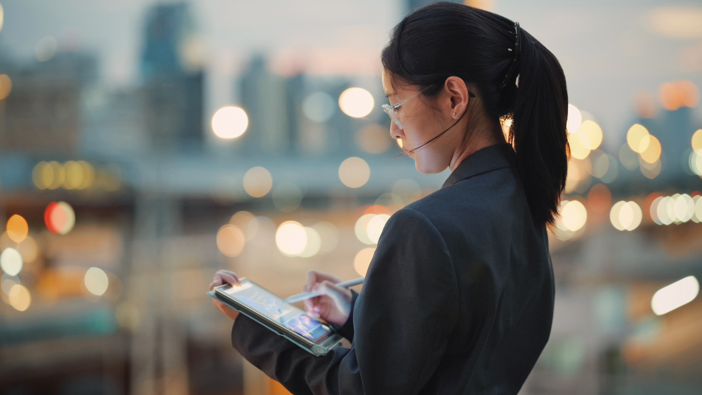 Global investor coding business AI tools on a digital tablet